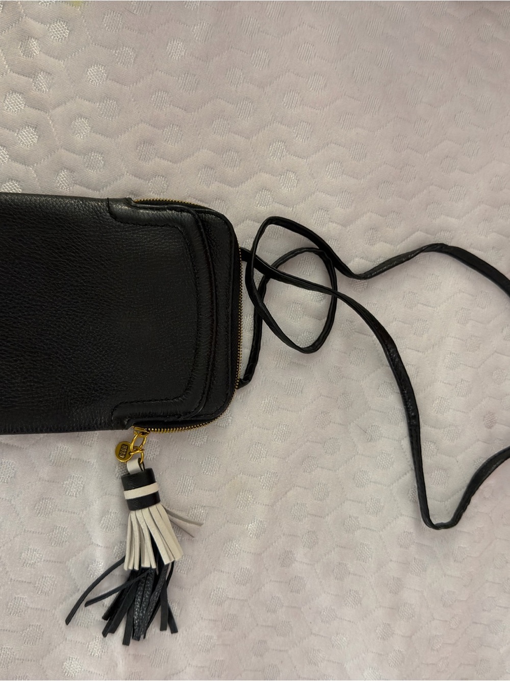 Hobo Black Crossbody Phone Bag with Black & White Tassel